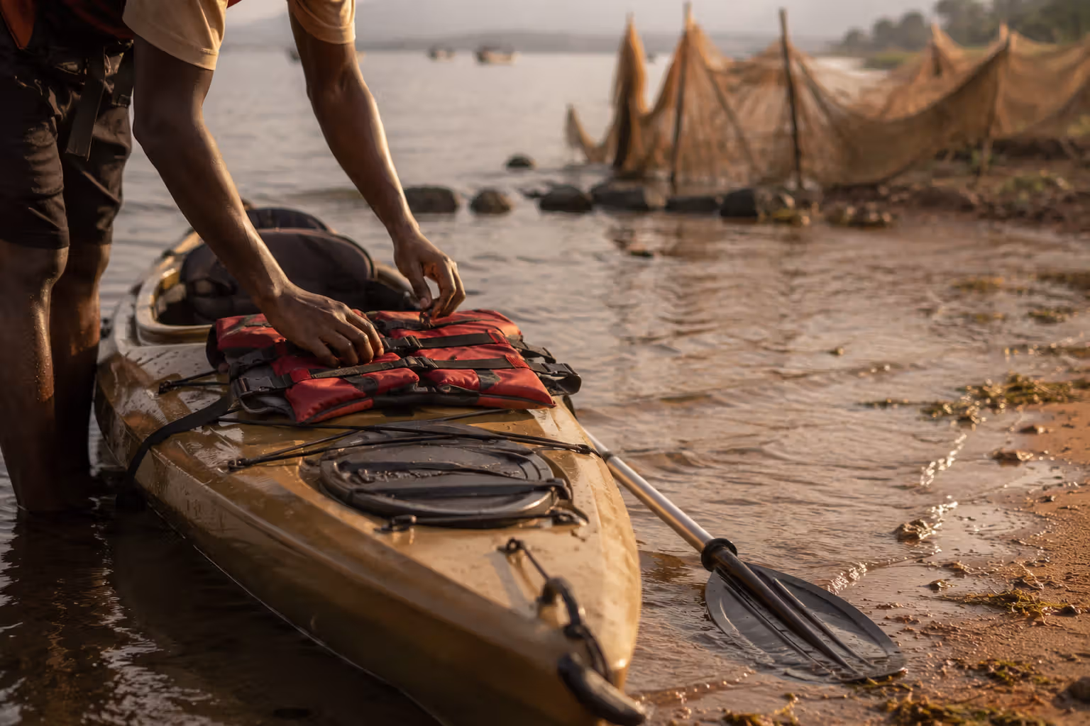 Kayak being prepared on the shore of Lake Victoria at Dunga Beach, Kisumu