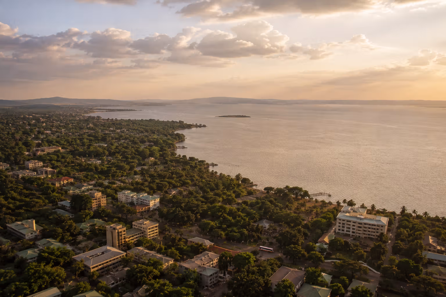 Aerial view of Kisumu city and Lake Victoria shoreline at sunset